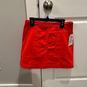 Bright red mini skirt